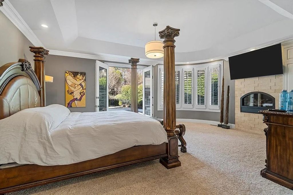 The Estate in Charlotte embodies modern luxury & amenities, now available for sale. This home located at 6312 Mitchell Hollow Rd, Charlotte, North Carolina