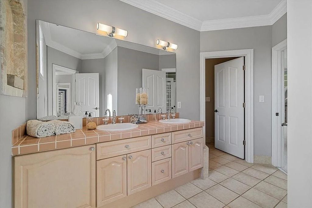 The Estate in Charlotte embodies modern luxury & amenities, now available for sale. This home located at 6312 Mitchell Hollow Rd, Charlotte, North Carolina