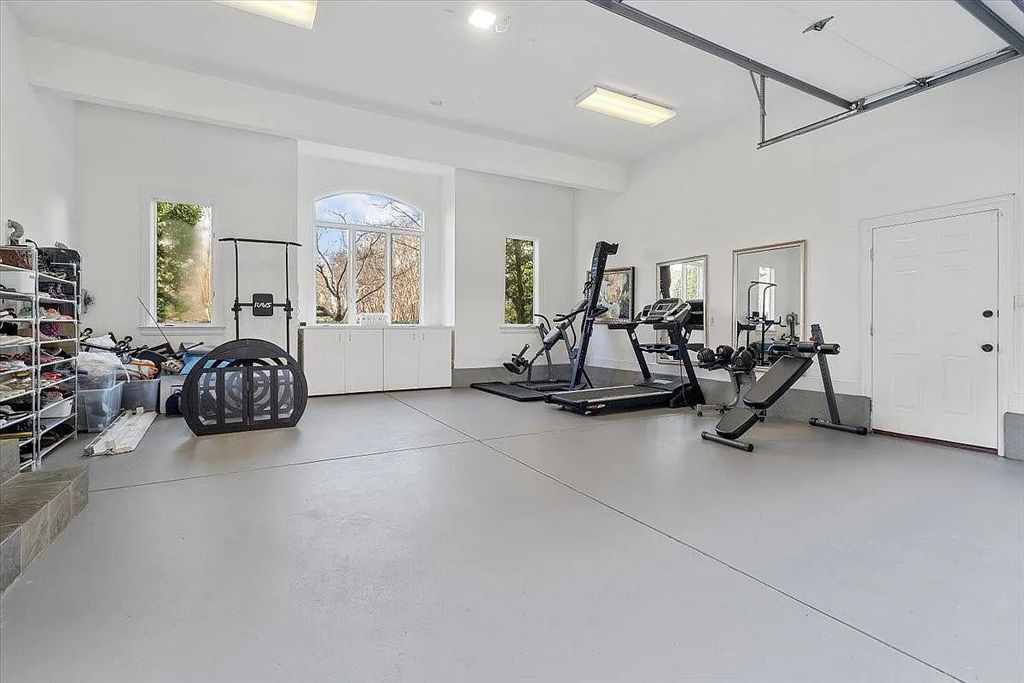 The Estate in Charlotte embodies modern luxury & amenities, now available for sale. This home located at 6312 Mitchell Hollow Rd, Charlotte, North Carolina