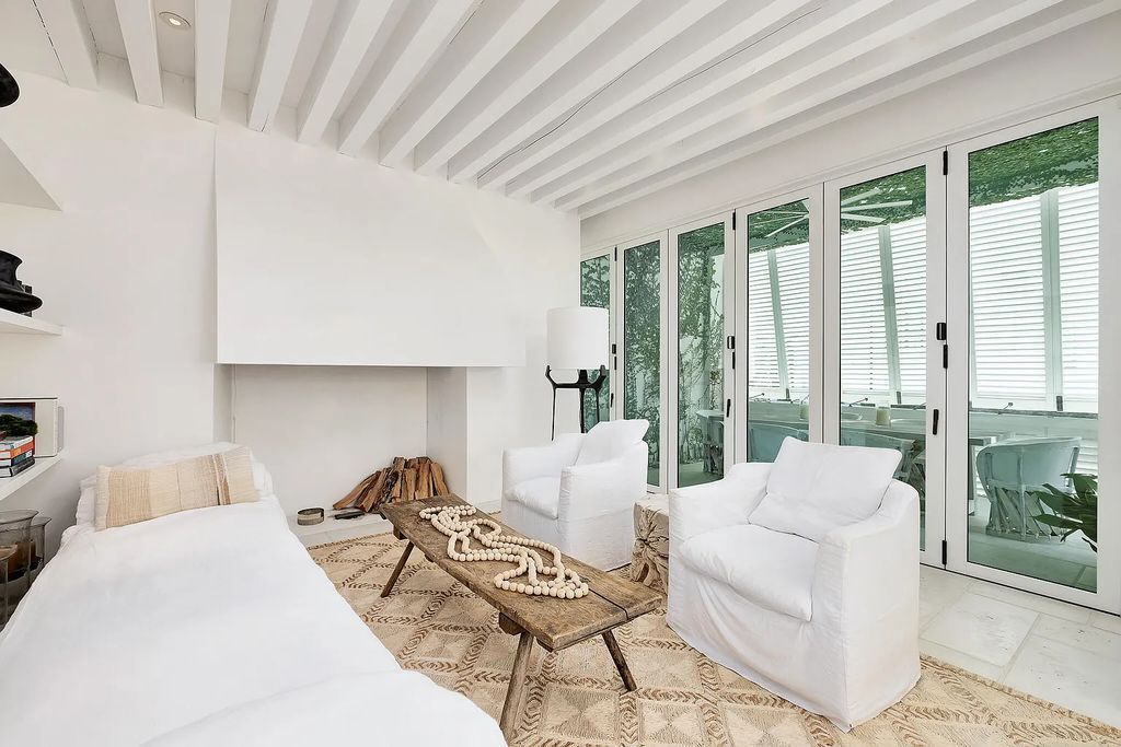 This stunning modernist retreat in the heart of Alys Beach, located at 116 S Charles Street, Inlet Beach, Florida, is a bespoke light-filled home with extraordinary architectural styling and sophisticated interior design.