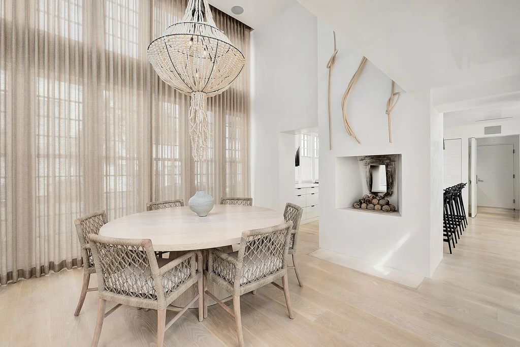 This stunning modernist retreat in the heart of Alys Beach, located at 116 S Charles Street, Inlet Beach, Florida, is a bespoke light-filled home with extraordinary architectural styling and sophisticated interior design.