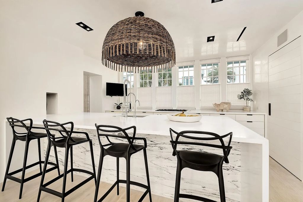 This stunning modernist retreat in the heart of Alys Beach, located at 116 S Charles Street, Inlet Beach, Florida, is a bespoke light-filled home with extraordinary architectural styling and sophisticated interior design.