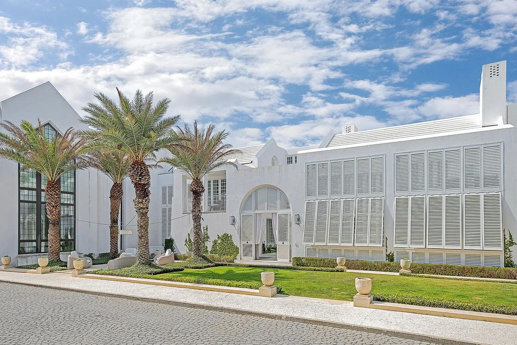 This stunning modernist retreat in the heart of Alys Beach, located at 116 S Charles Street, Inlet Beach, Florida, is a bespoke light-filled home with extraordinary architectural styling and sophisticated interior design.