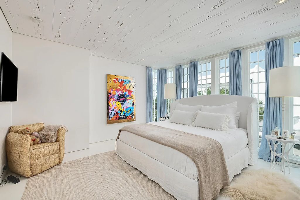 This stunning modernist retreat in the heart of Alys Beach, located at 116 S Charles Street, Inlet Beach, Florida, is a bespoke light-filled home with extraordinary architectural styling and sophisticated interior design.