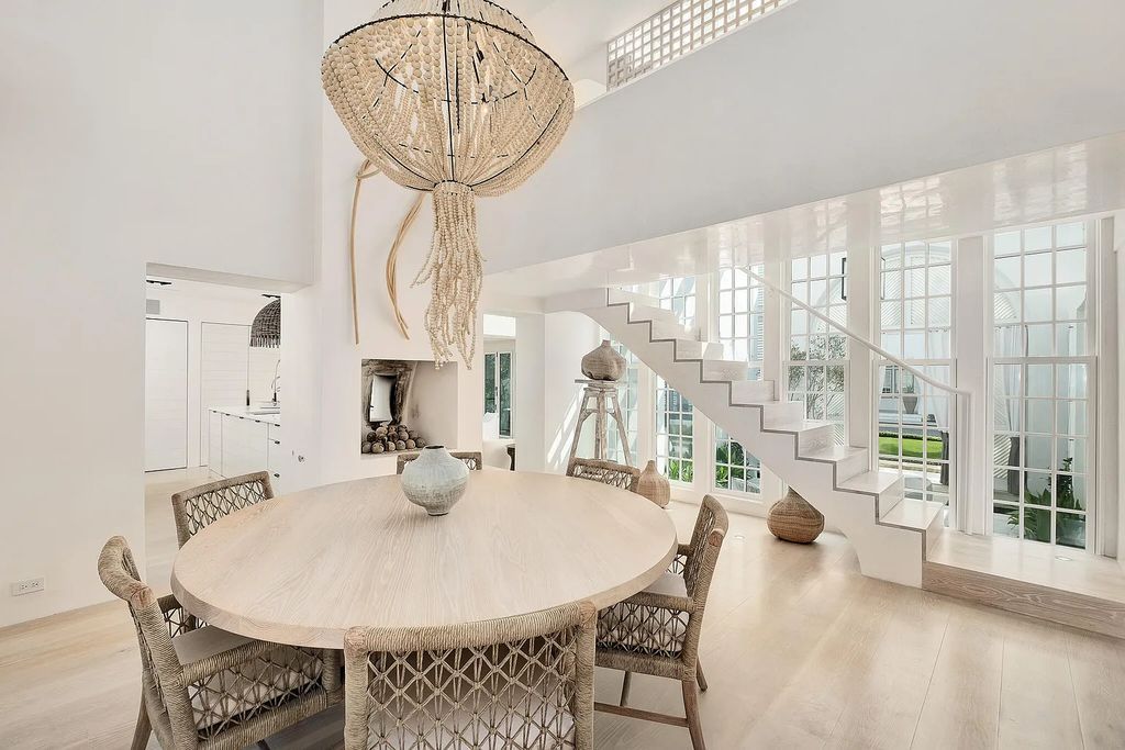 This stunning modernist retreat in the heart of Alys Beach, located at 116 S Charles Street, Inlet Beach, Florida, is a bespoke light-filled home with extraordinary architectural styling and sophisticated interior design.