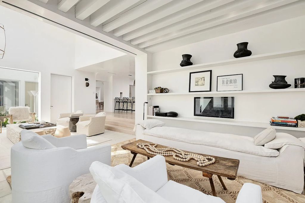 This stunning modernist retreat in the heart of Alys Beach, located at 116 S Charles Street, Inlet Beach, Florida, is a bespoke light-filled home with extraordinary architectural styling and sophisticated interior design.