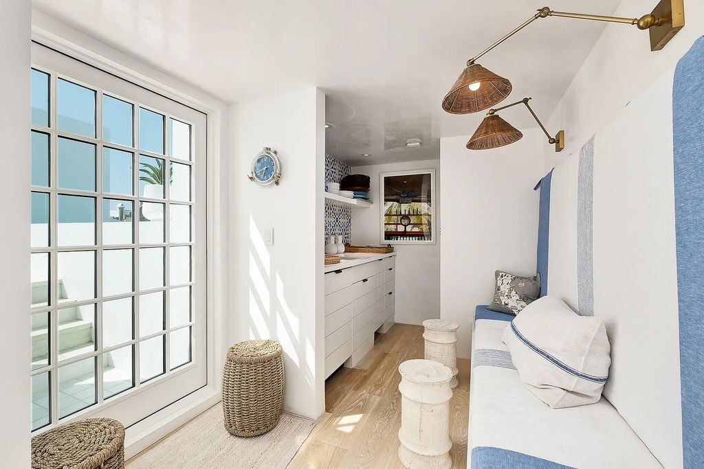 This stunning modernist retreat in the heart of Alys Beach, located at 116 S Charles Street, Inlet Beach, Florida, is a bespoke light-filled home with extraordinary architectural styling and sophisticated interior design.