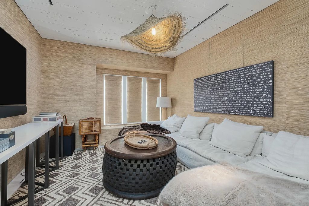 This stunning modernist retreat in the heart of Alys Beach, located at 116 S Charles Street, Inlet Beach, Florida, is a bespoke light-filled home with extraordinary architectural styling and sophisticated interior design.
