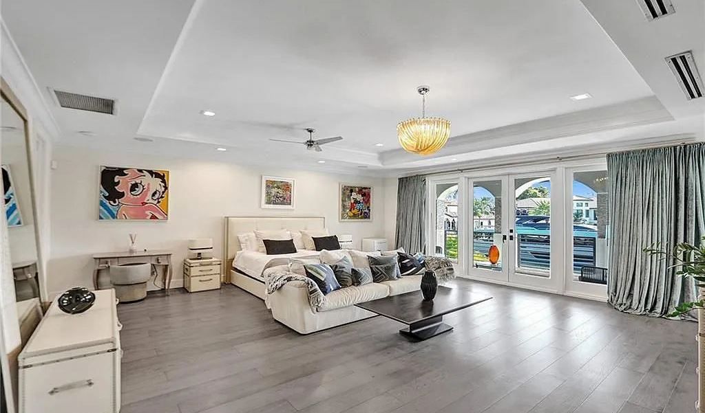 Discover a life of luxury and sophistication at 34 Isla Bahia Drive in Fort Lauderdale, Florida. This luxurious home boasts 6 bedrooms and 8 bathrooms, with over 8,000 square feet of living space situated on a spacious 0.30-acre lot.