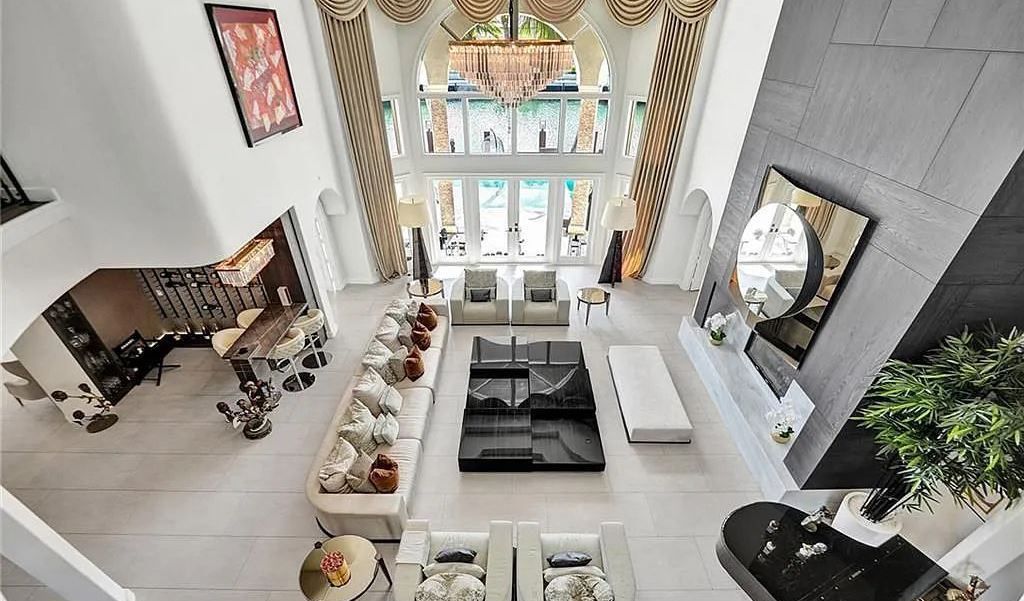 Discover a life of luxury and sophistication at 34 Isla Bahia Drive in Fort Lauderdale, Florida. This luxurious home boasts 6 bedrooms and 8 bathrooms, with over 8,000 square feet of living space situated on a spacious 0.30-acre lot.