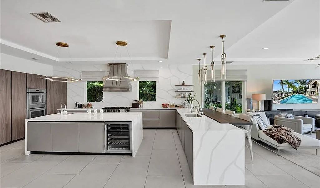 Discover a life of luxury and sophistication at 34 Isla Bahia Drive in Fort Lauderdale, Florida. This luxurious home boasts 6 bedrooms and 8 bathrooms, with over 8,000 square feet of living space situated on a spacious 0.30-acre lot.