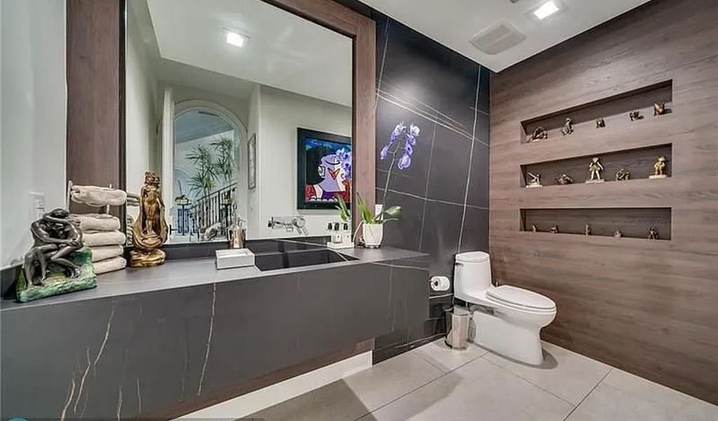 Discover a life of luxury and sophistication at 34 Isla Bahia Drive in Fort Lauderdale, Florida. This luxurious home boasts 6 bedrooms and 8 bathrooms, with over 8,000 square feet of living space situated on a spacious 0.30-acre lot.