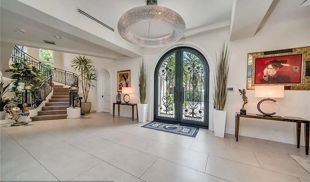 Discover a life of luxury and sophistication at 34 Isla Bahia Drive in Fort Lauderdale, Florida. This luxurious home boasts 6 bedrooms and 8 bathrooms, with over 8,000 square feet of living space situated on a spacious 0.30-acre lot.