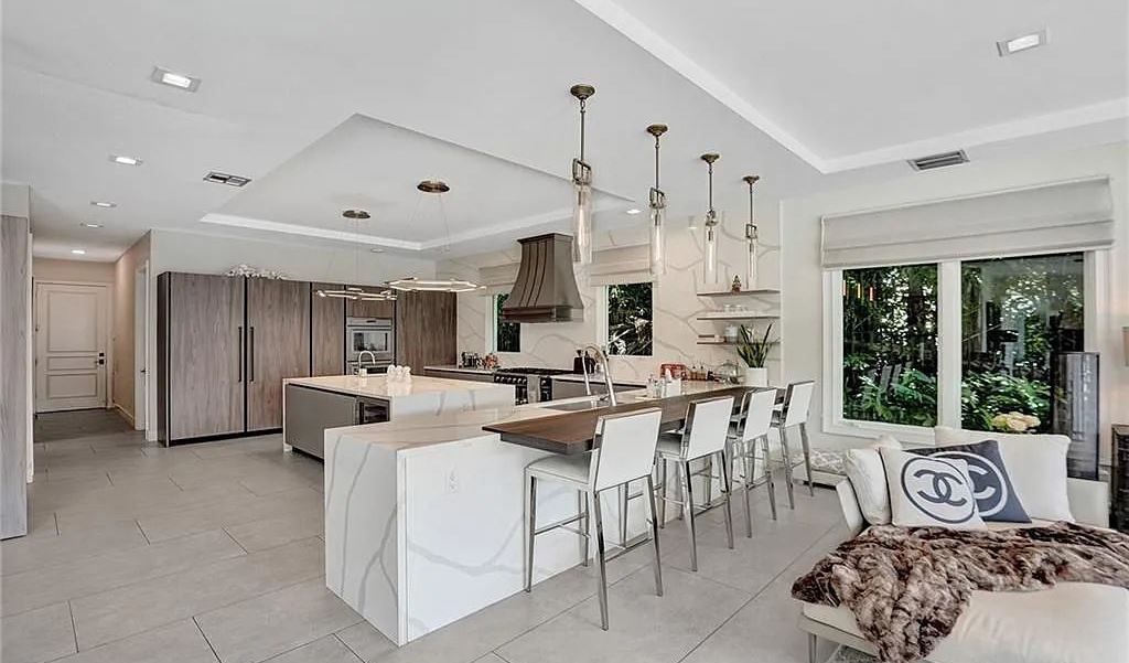 Discover a life of luxury and sophistication at 34 Isla Bahia Drive in Fort Lauderdale, Florida. This luxurious home boasts 6 bedrooms and 8 bathrooms, with over 8,000 square feet of living space situated on a spacious 0.30-acre lot.