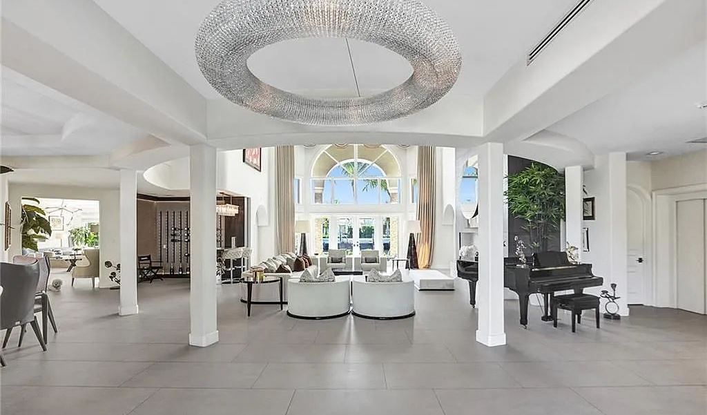 Discover a life of luxury and sophistication at 34 Isla Bahia Drive in Fort Lauderdale, Florida. This luxurious home boasts 6 bedrooms and 8 bathrooms, with over 8,000 square feet of living space situated on a spacious 0.30-acre lot.