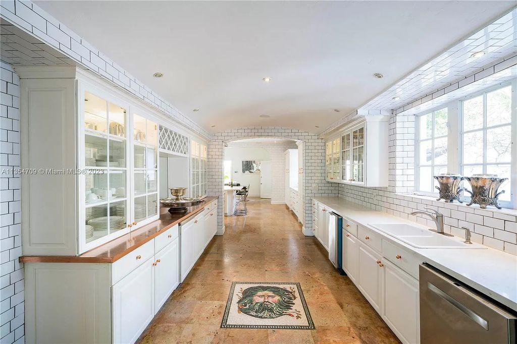 Villa Crono is a stunning Mediterranean-style estate located at 4731 Pine Tree Drive in Miami Beach, Florida. The property features 9 bedrooms, 9 bathrooms, and 9,605 square feet of living space on a rare 42,600 square foot lot with 100 feet of water frontage and no fixed bridges.