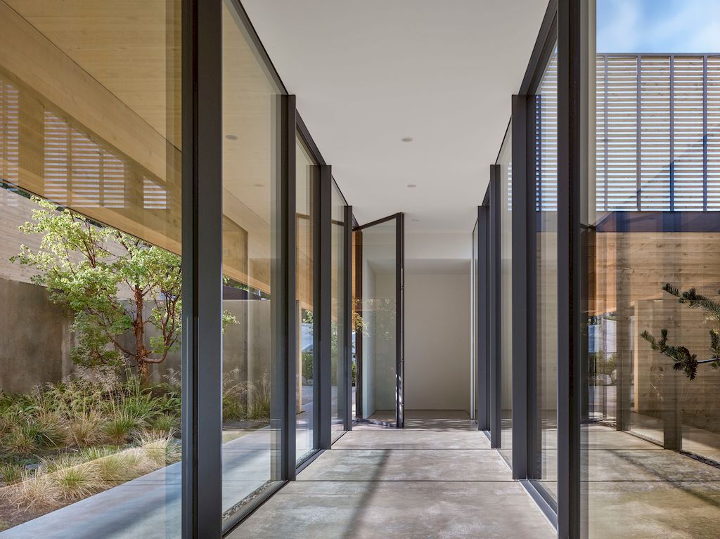 Four & Four House with Unobstructed Views of Water by Mcleod Bovell