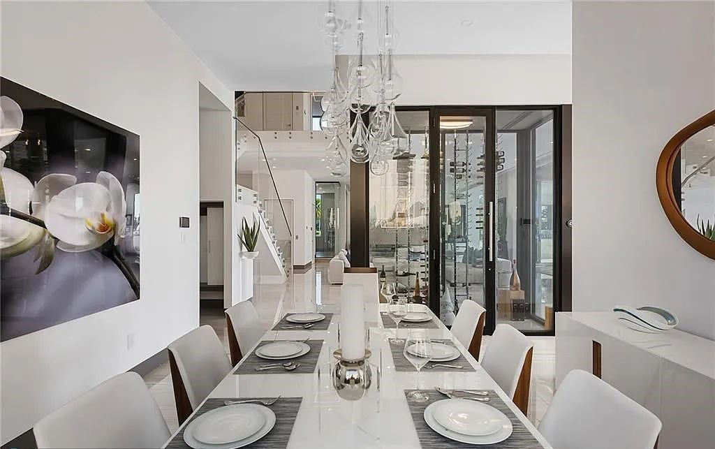Experience modern coastal living at its finest with 1425 E Lake Drive, a stunning 5-bedroom, 8-bathroom home in prestigious Harbor Beach, Fort Lauderdale, Florida.