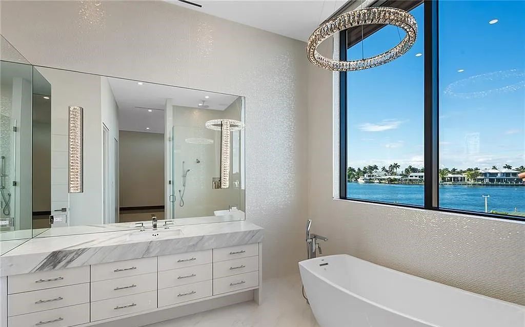 Experience modern coastal living at its finest with 1425 E Lake Drive, a stunning 5-bedroom, 8-bathroom home in prestigious Harbor Beach, Fort Lauderdale, Florida.
