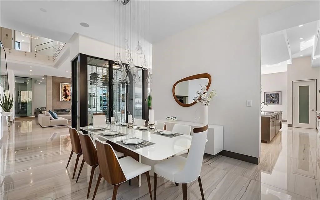 Experience modern coastal living at its finest with 1425 E Lake Drive, a stunning 5-bedroom, 8-bathroom home in prestigious Harbor Beach, Fort Lauderdale, Florida.