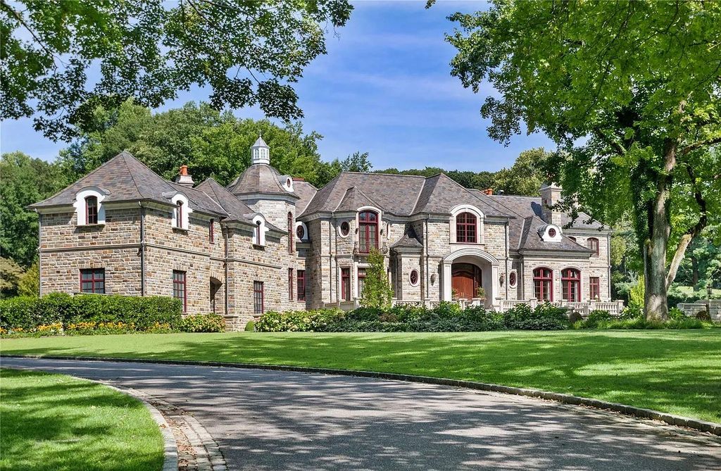 The Property in Mill Neck is a brand new estate complete with indoor pool, elegant pond, state of the art greenhouse and six-car garage, now available for sale. This home located at 102 Horseshoe Road, Mill Neck, New York