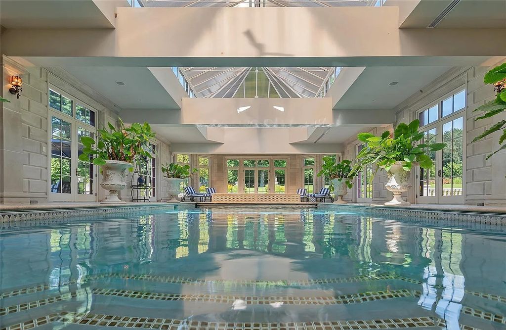 The Property in Mill Neck is a brand new estate complete with indoor pool, elegant pond, state of the art greenhouse and six-car garage, now available for sale. This home located at 102 Horseshoe Road, Mill Neck, New York