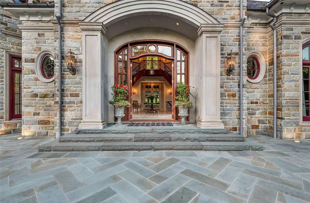 The Property in Mill Neck is a brand new estate complete with indoor pool, elegant pond, state of the art greenhouse and six-car garage, now available for sale. This home located at 102 Horseshoe Road, Mill Neck, New York