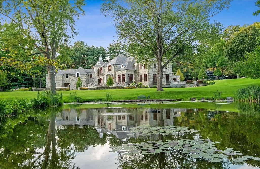 The Property in Mill Neck is a brand new estate complete with indoor pool, elegant pond, state of the art greenhouse and six-car garage, now available for sale. This home located at 102 Horseshoe Road, Mill Neck, New York