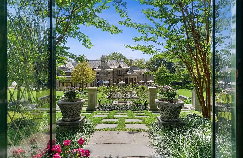 The Property in Mill Neck is a brand new estate complete with indoor pool, elegant pond, state of the art greenhouse and six-car garage, now available for sale. This home located at 102 Horseshoe Road, Mill Neck, New York