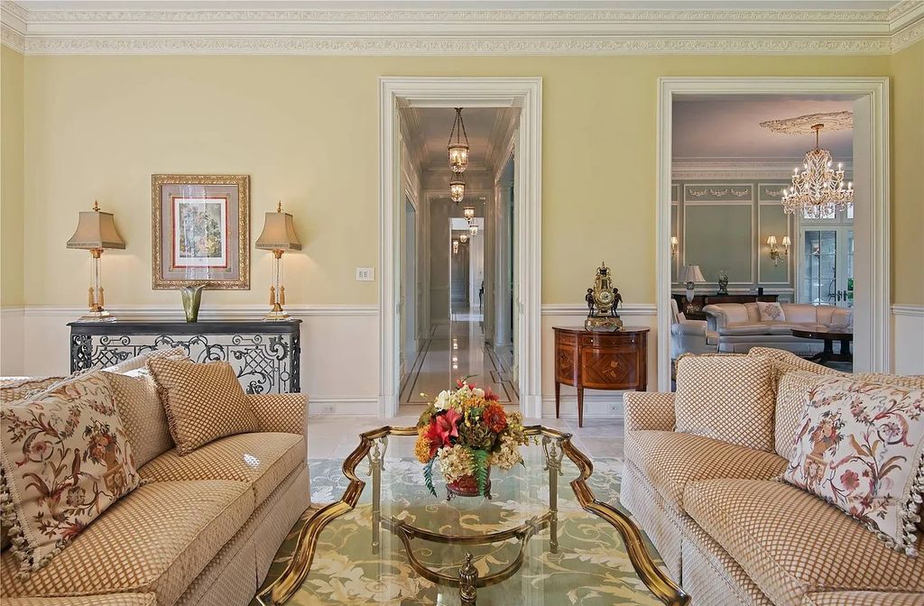 The Property in Mill Neck is a brand new estate complete with indoor pool, elegant pond, state of the art greenhouse and six-car garage, now available for sale. This home located at 102 Horseshoe Road, Mill Neck, New York