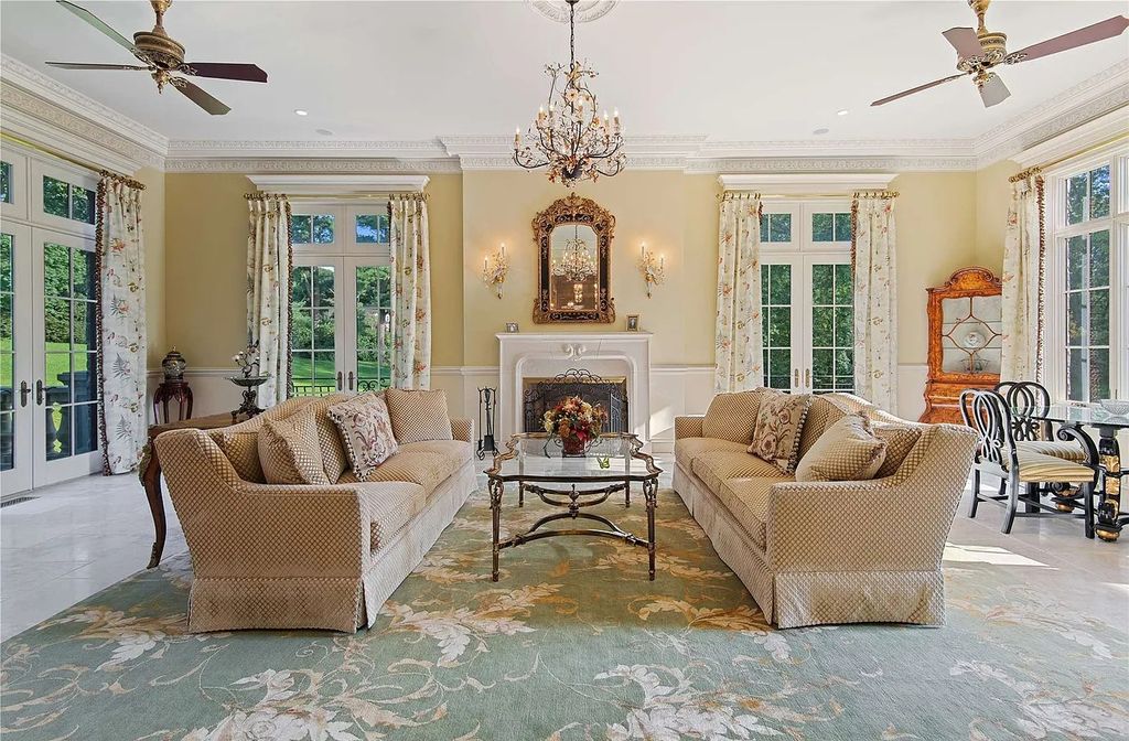 The Property in Mill Neck is a brand new estate complete with indoor pool, elegant pond, state of the art greenhouse and six-car garage, now available for sale. This home located at 102 Horseshoe Road, Mill Neck, New York
