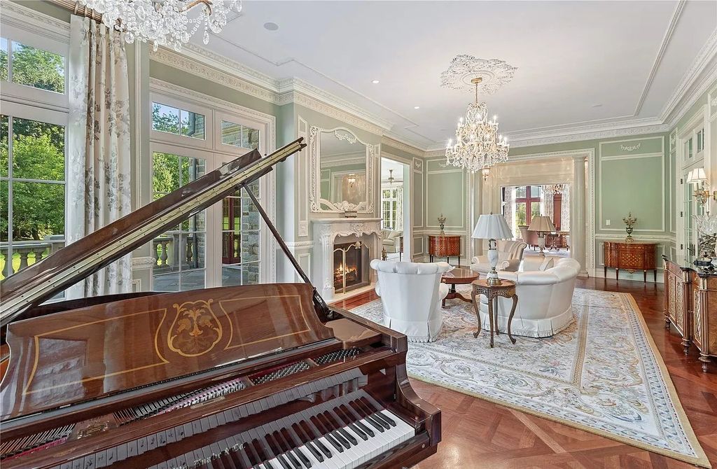 The Property in Mill Neck is a brand new estate complete with indoor pool, elegant pond, state of the art greenhouse and six-car garage, now available for sale. This home located at 102 Horseshoe Road, Mill Neck, New York