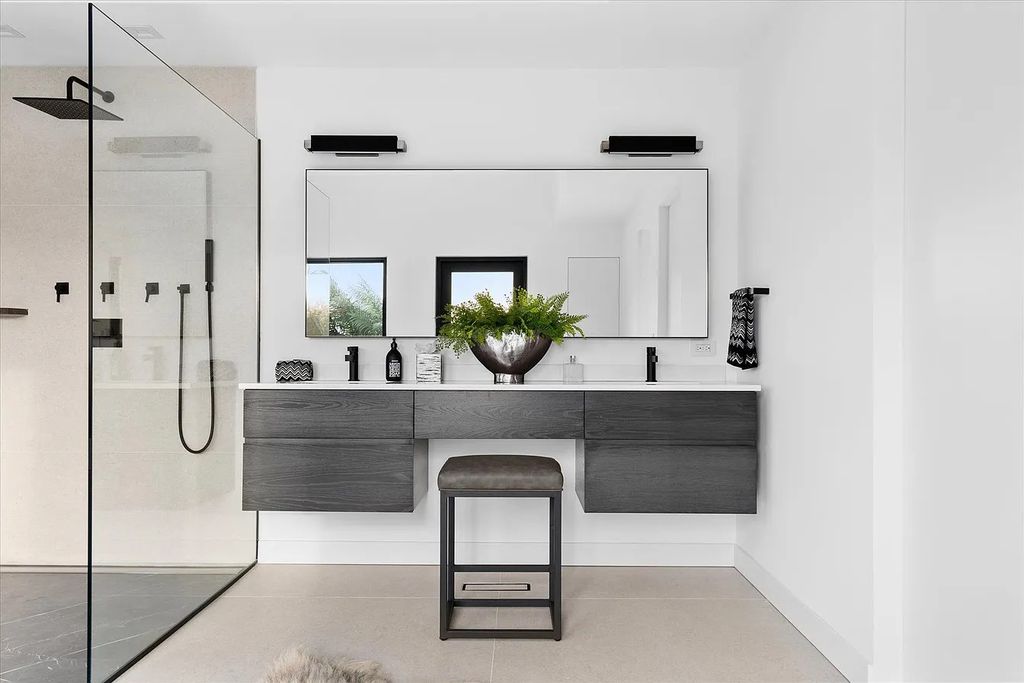 The House in Bridgehampton features an entertainer's floor plan that flows seamlessly into each room with an abundance of natural light, now available for sale. This home located at 1076 Ocean Rd, Bridgehampton, New York