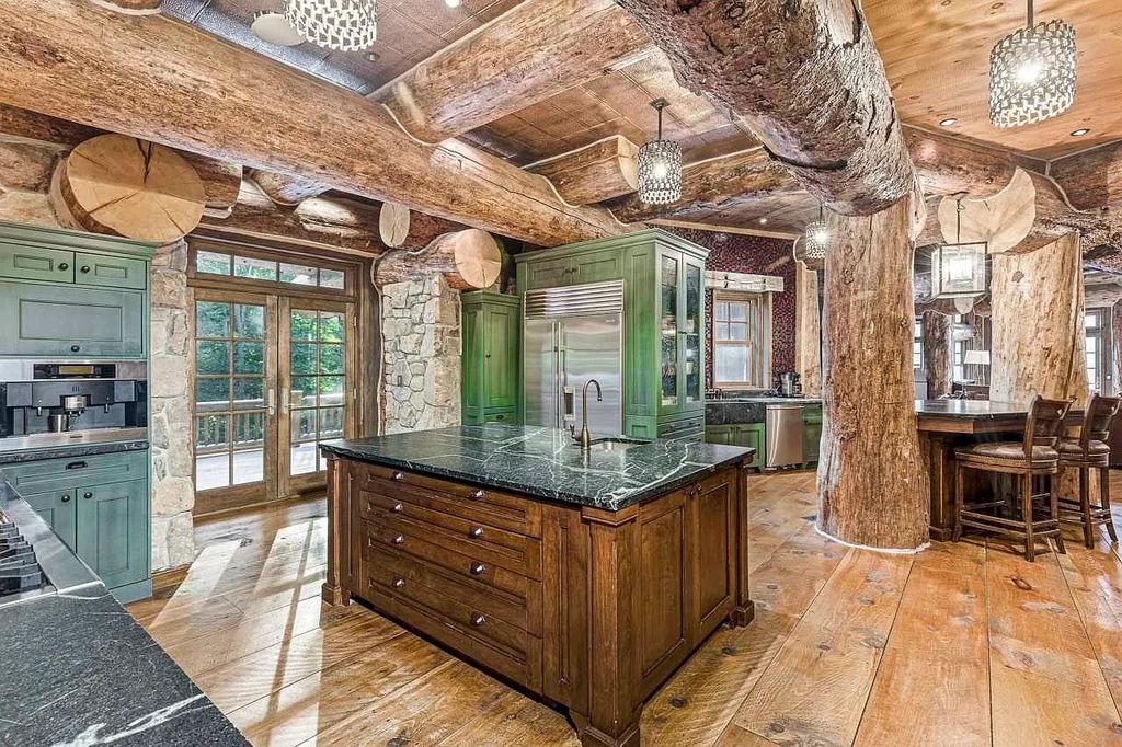 The Home in Millbrook is constructed of standing dead timber from the west and immense stone from Pennsylvania, now available for sale. This home located at 521 Stanford Rd, Millbrook, New York