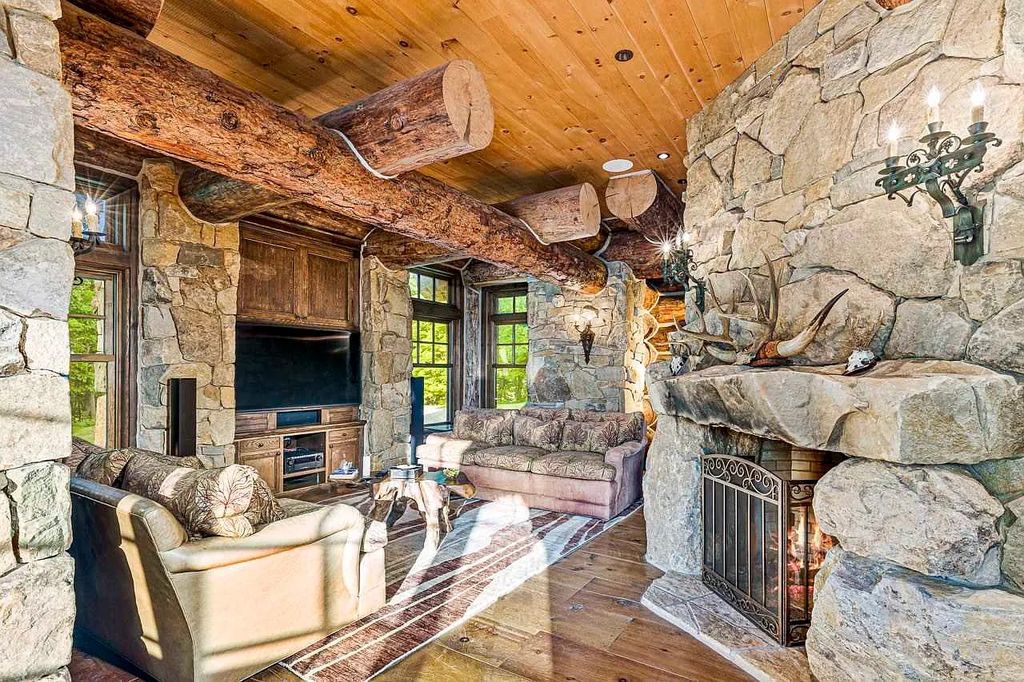 The Home in Millbrook is constructed of standing dead timber from the west and immense stone from Pennsylvania, now available for sale. This home located at 521 Stanford Rd, Millbrook, New York