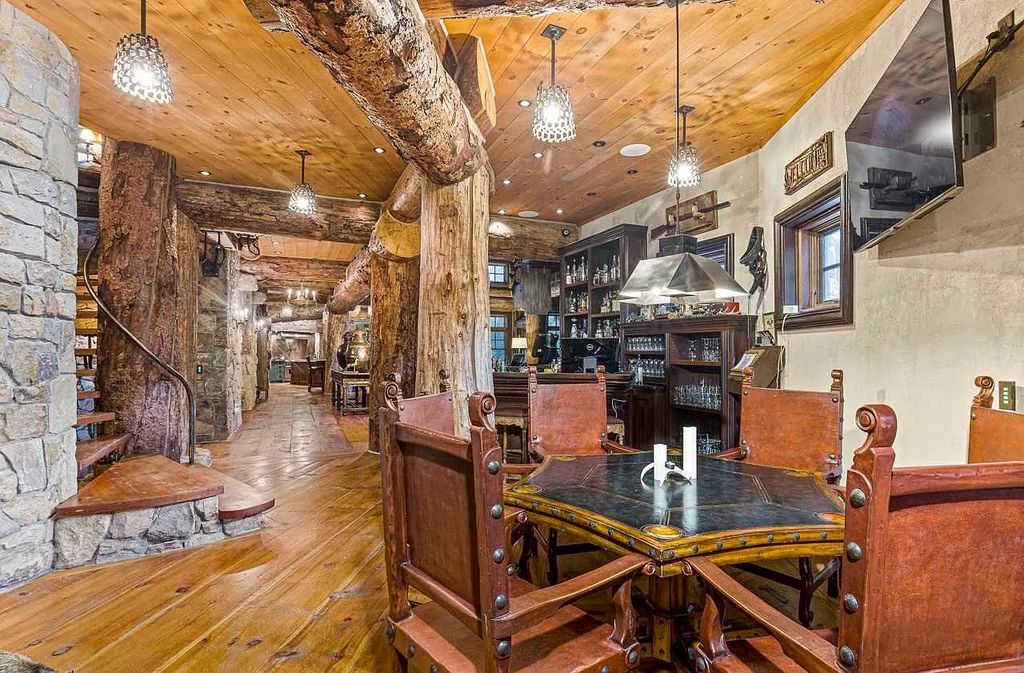 The Home in Millbrook is constructed of standing dead timber from the west and immense stone from Pennsylvania, now available for sale. This home located at 521 Stanford Rd, Millbrook, New York