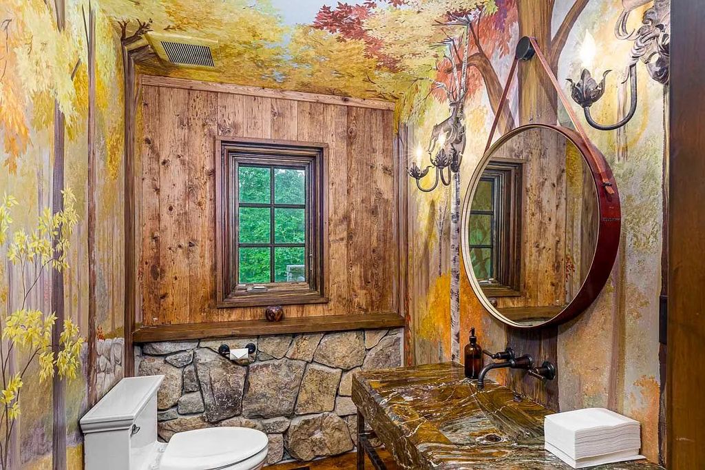 The Home in Millbrook is constructed of standing dead timber from the west and immense stone from Pennsylvania, now available for sale. This home located at 521 Stanford Rd, Millbrook, New York