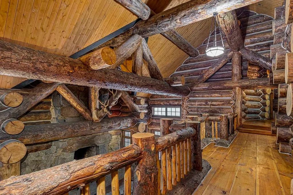 The Home in Millbrook is constructed of standing dead timber from the west and immense stone from Pennsylvania, now available for sale. This home located at 521 Stanford Rd, Millbrook, New York
