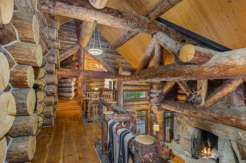 The Home in Millbrook is constructed of standing dead timber from the west and immense stone from Pennsylvania, now available for sale. This home located at 521 Stanford Rd, Millbrook, New York