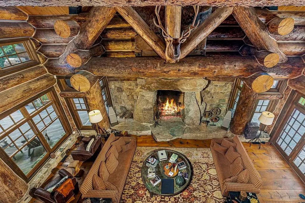 The Home in Millbrook is constructed of standing dead timber from the west and immense stone from Pennsylvania, now available for sale. This home located at 521 Stanford Rd, Millbrook, New York