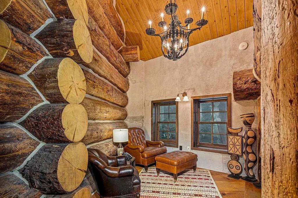 The Home in Millbrook is constructed of standing dead timber from the west and immense stone from Pennsylvania, now available for sale. This home located at 521 Stanford Rd, Millbrook, New York