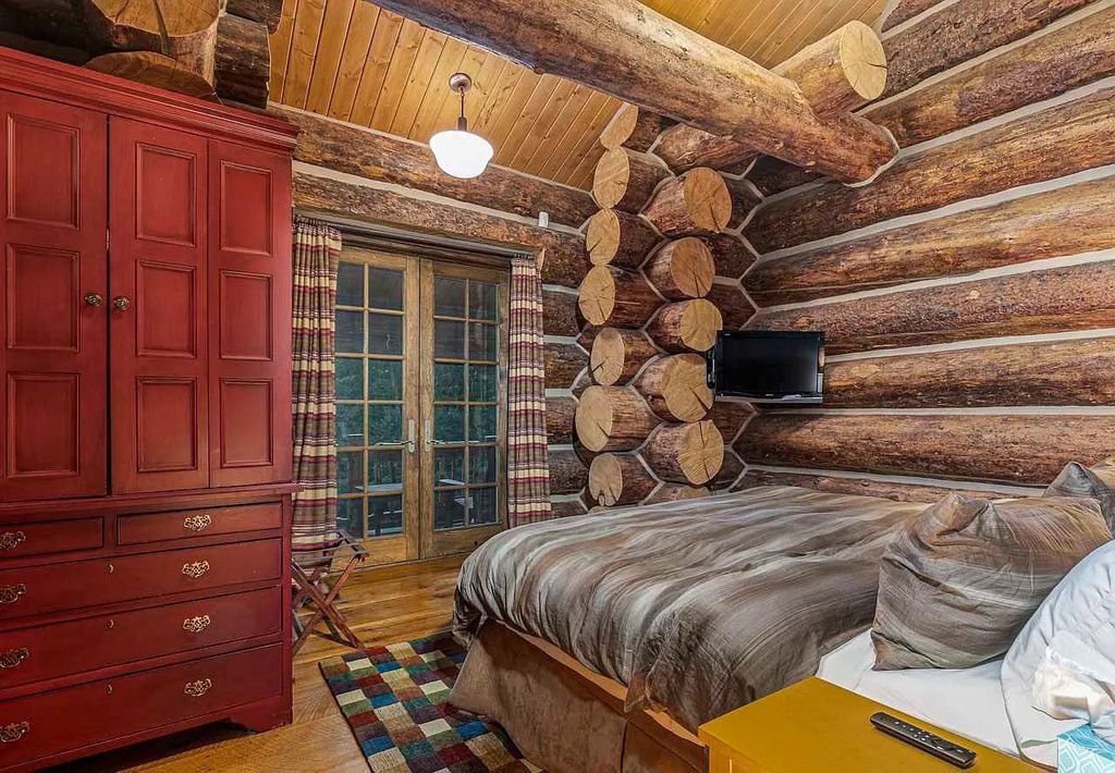 The Home in Millbrook is constructed of standing dead timber from the west and immense stone from Pennsylvania, now available for sale. This home located at 521 Stanford Rd, Millbrook, New York