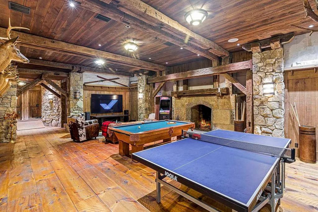 The Home in Millbrook is constructed of standing dead timber from the west and immense stone from Pennsylvania, now available for sale. This home located at 521 Stanford Rd, Millbrook, New York