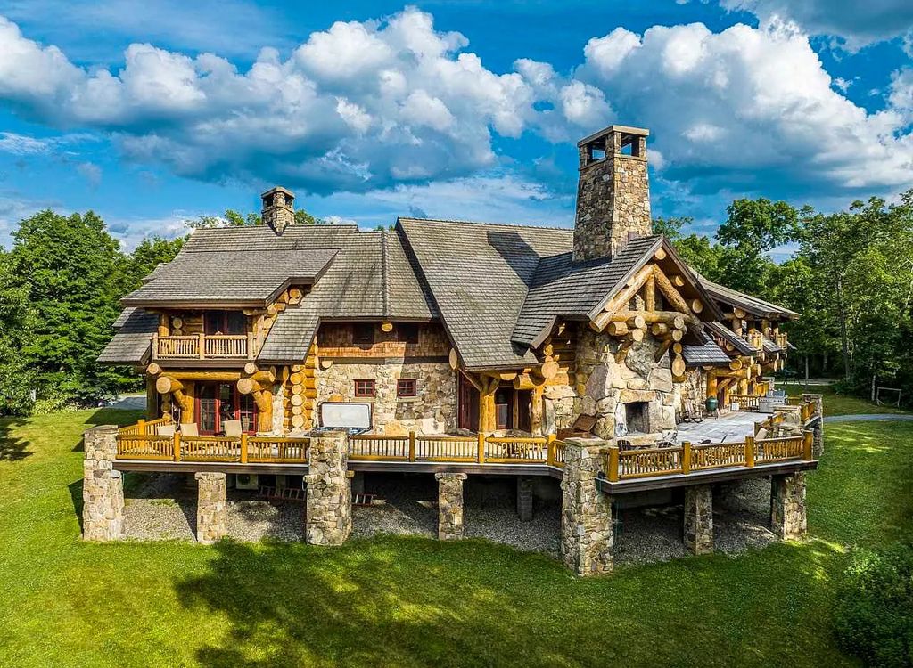 The Home in Millbrook is constructed of standing dead timber from the west and immense stone from Pennsylvania, now available for sale. This home located at 521 Stanford Rd, Millbrook, New York