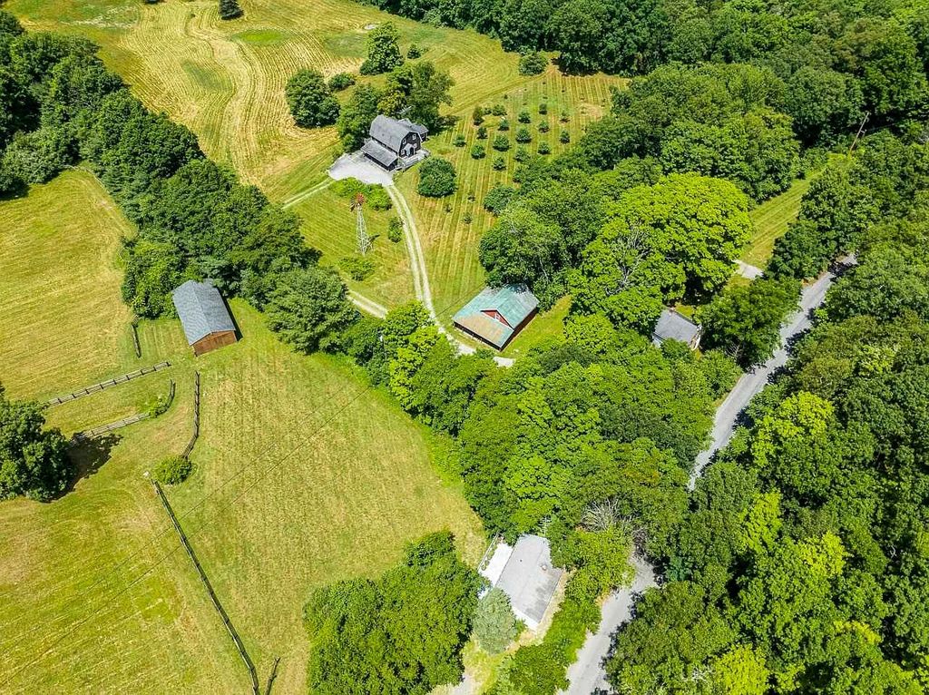 The Home in Millbrook is constructed of standing dead timber from the west and immense stone from Pennsylvania, now available for sale. This home located at 521 Stanford Rd, Millbrook, New York