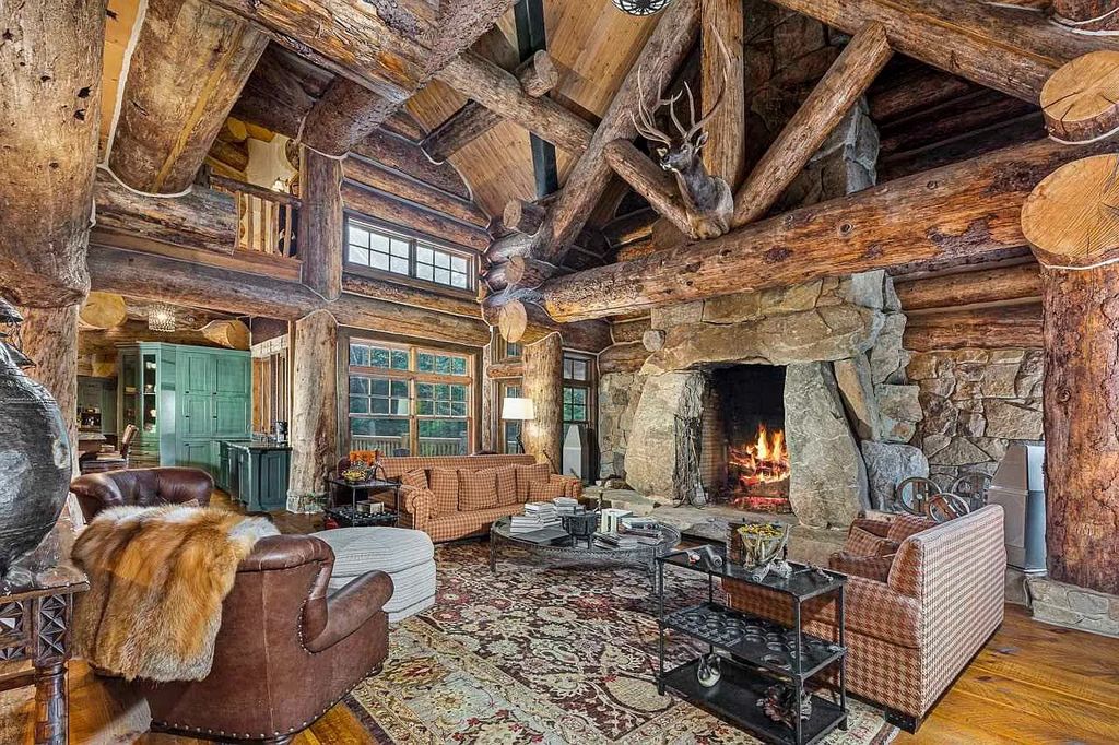 The Home in Millbrook is constructed of standing dead timber from the west and immense stone from Pennsylvania, now available for sale. This home located at 521 Stanford Rd, Millbrook, New York