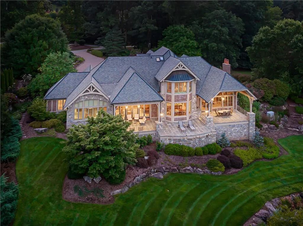 The Estate in Arden offers superb architectural features and radiates timeless elegance, now available for sale. This home located at 1322 Fawn Meadow Way, Arden, North Carolina