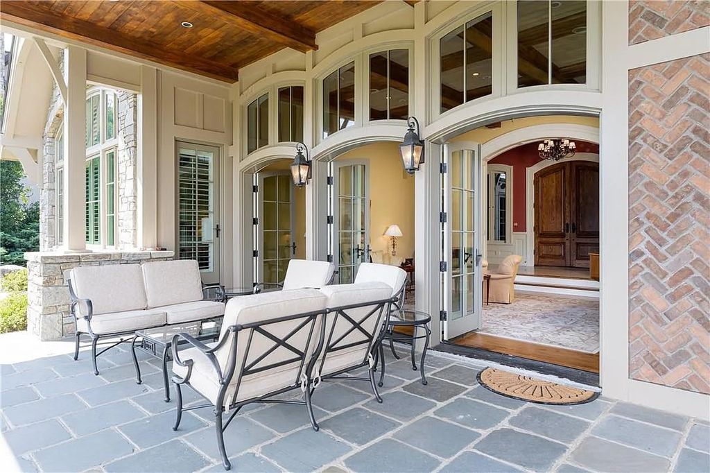 The Estate in Arden offers superb architectural features and radiates timeless elegance, now available for sale. This home located at 1322 Fawn Meadow Way, Arden, North Carolina