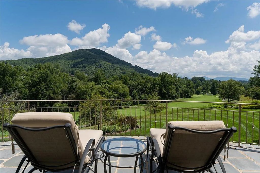 The Estate in Arden offers superb architectural features and radiates timeless elegance, now available for sale. This home located at 1322 Fawn Meadow Way, Arden, North Carolina