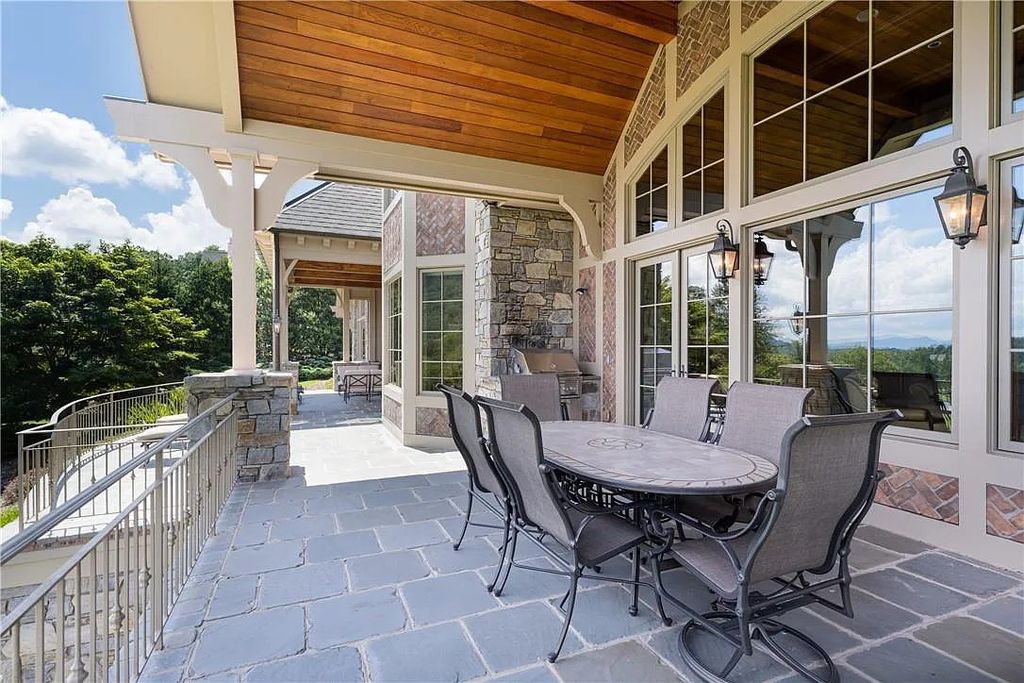 The Estate in Arden offers superb architectural features and radiates timeless elegance, now available for sale. This home located at 1322 Fawn Meadow Way, Arden, North Carolina